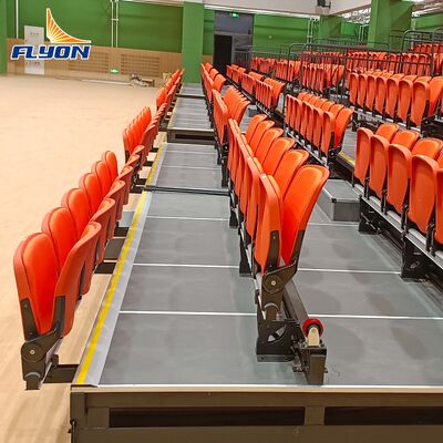 Bon prix Assises électriques à télescope rétractable avec chaises pliantes montées sur le monteur et finition imperméable pour gymnase en ligne